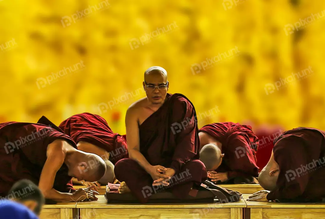 Free Premium Stock Photos A beautiful and serene depiction of Buddhist monks in prayer