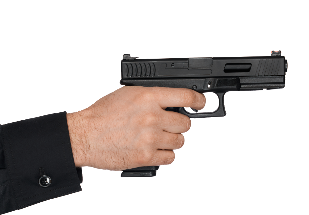 Free Premium PNG A man pulling the trigger while holding shortbarrelled handgun