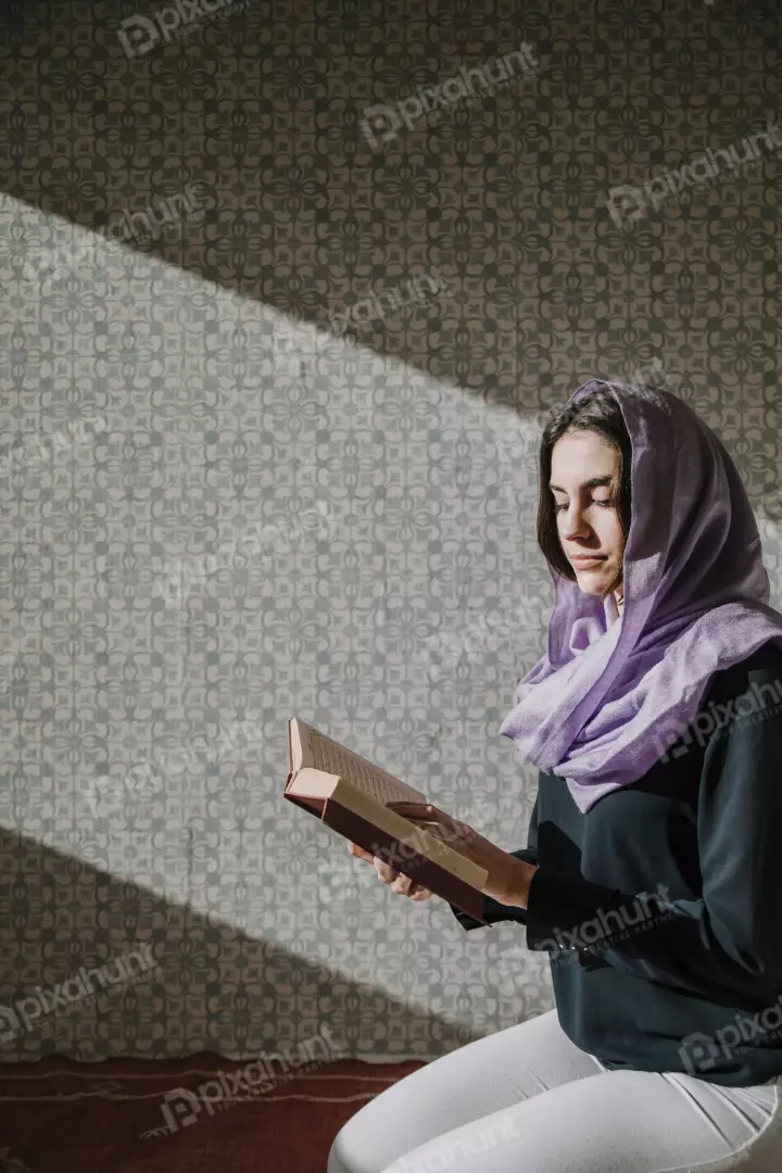 Free Premium Stock Photos A Muslim woman reading in quran Koran