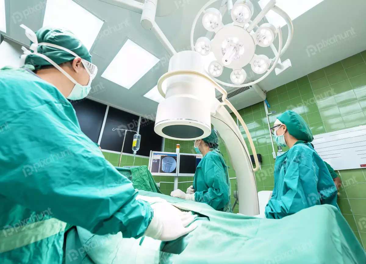 Free Premium Stock Photos A patient is perspective looking up at the surgical team