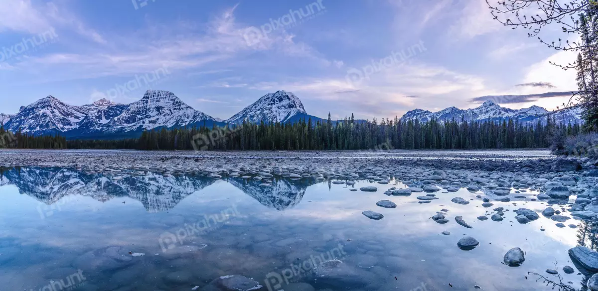 Free Premium Stock Photos beautiful landscape of the Canadian Rockies and mountains are covered in snow and the water is a crystal clear blue