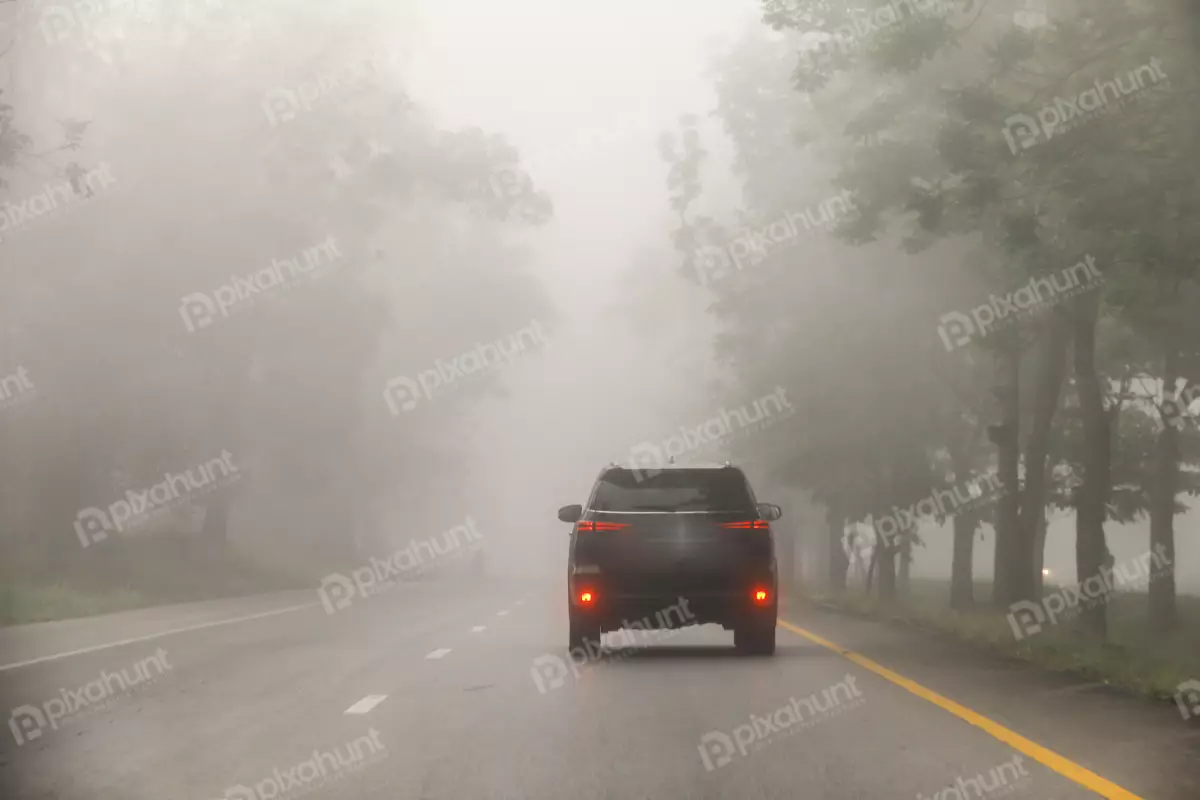 Free Premium Stock Photos Blurred hard foggy road with detail of car light, transportation concept
