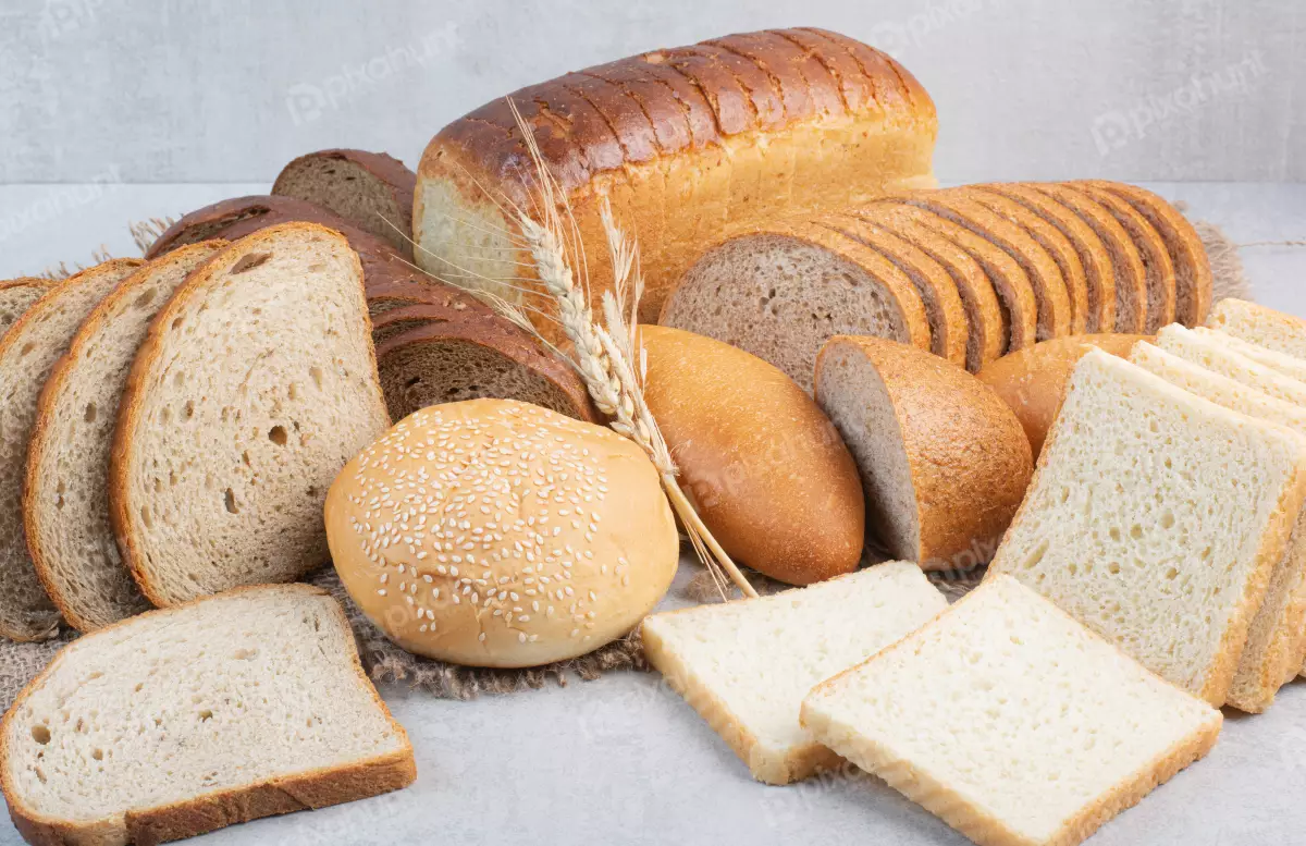 Free Premium Stock Photos Breakfast Set of various bread on stone surface | Bread Breakfast fresh food
