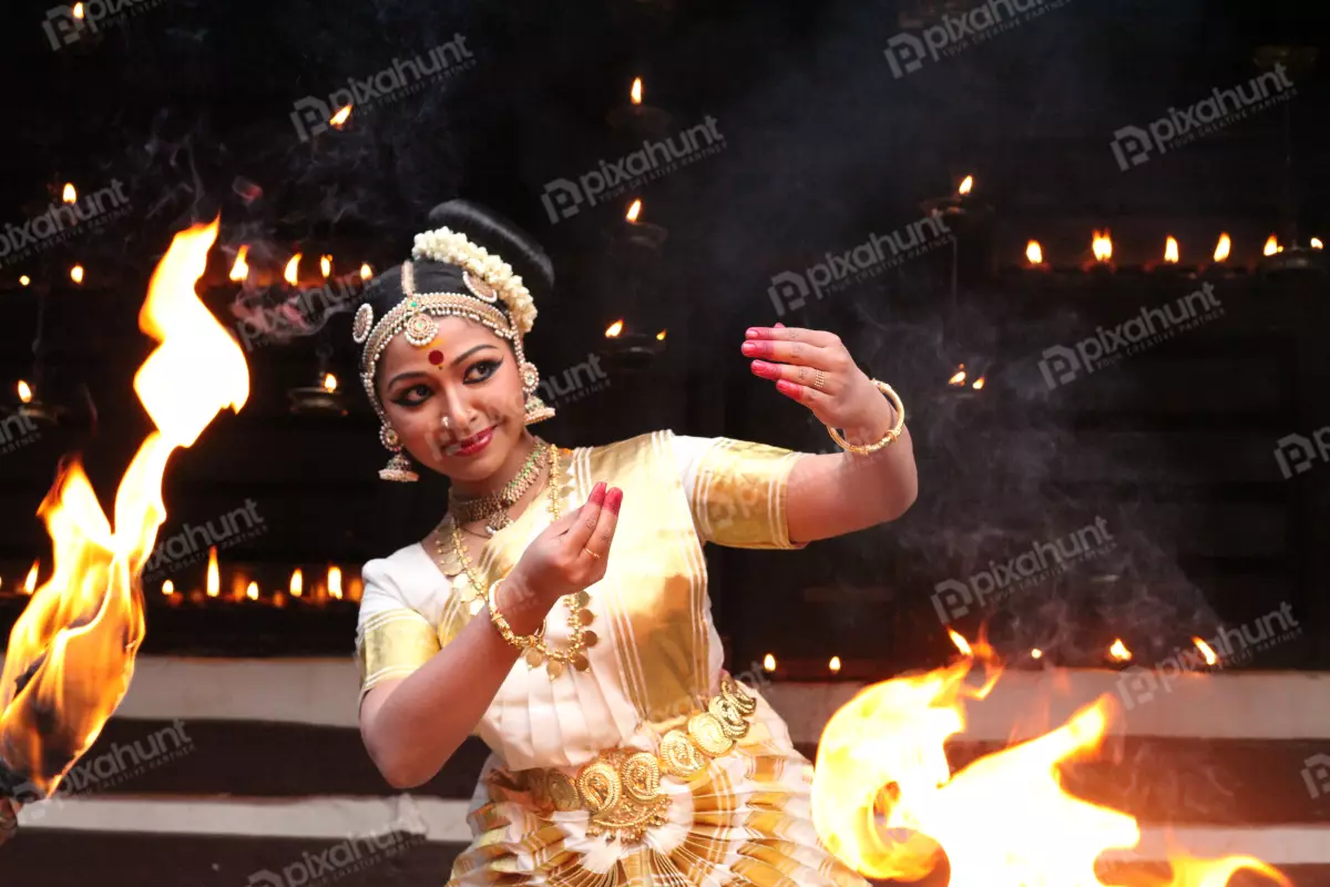 Free Premium Stock Photos classical dance form of kerala,distinct for the graceful body movements