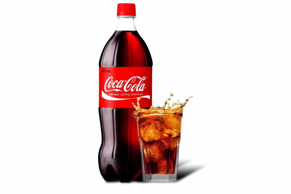 Free Premium PNG Coca-Cola and a glass filled with Coke ice from the bottle