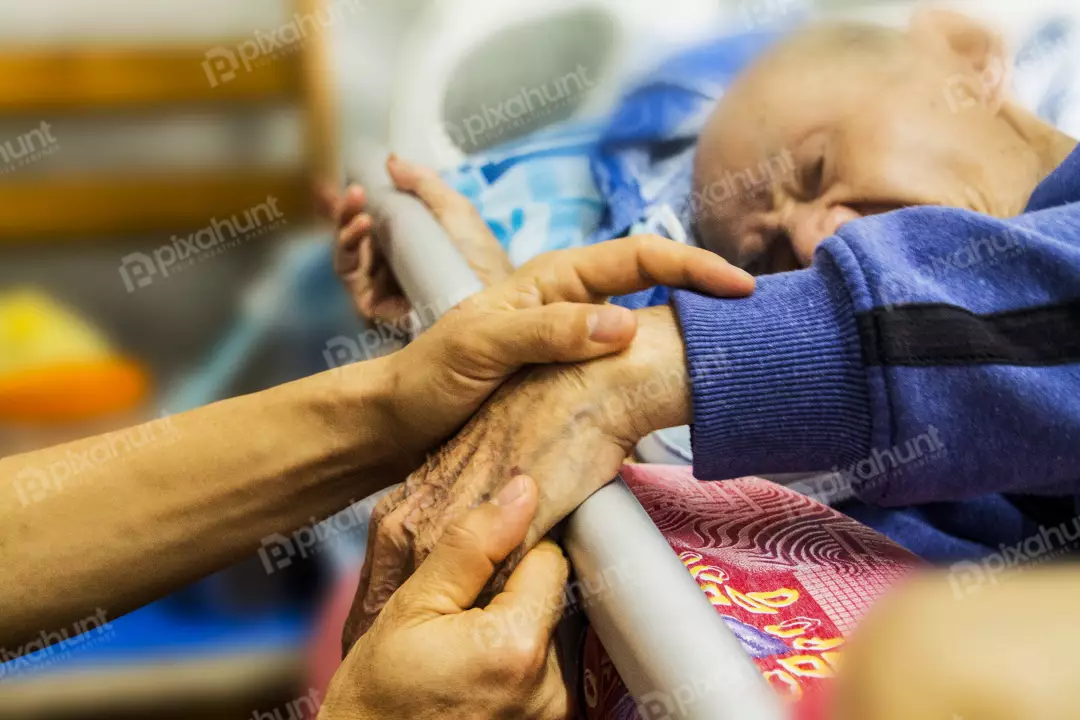 Free Premium Stock Photos Elderly man holding the hand of her wife at the hands of the hospital