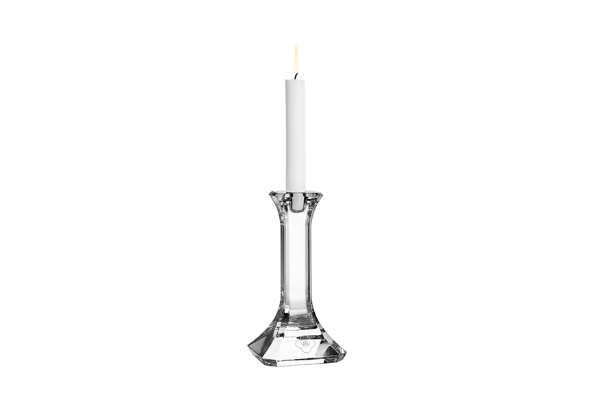 Free Premium PNG Front view of white candle in golden stand on PNG