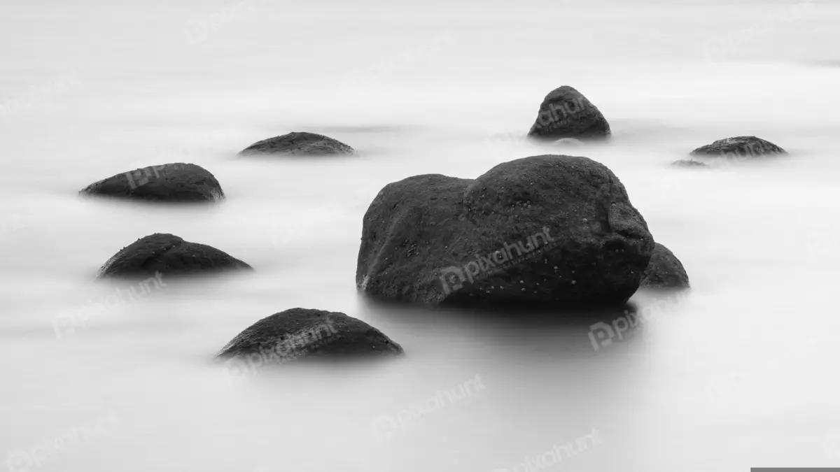 Free Premium Stock Photos Group of rocks in the ocean and rocks are of different sizes and shapes