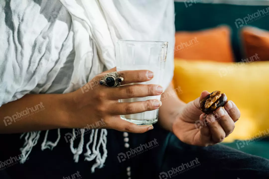 Free Premium Stock Photos It is time for iftar so he is standing with dates and water in hand