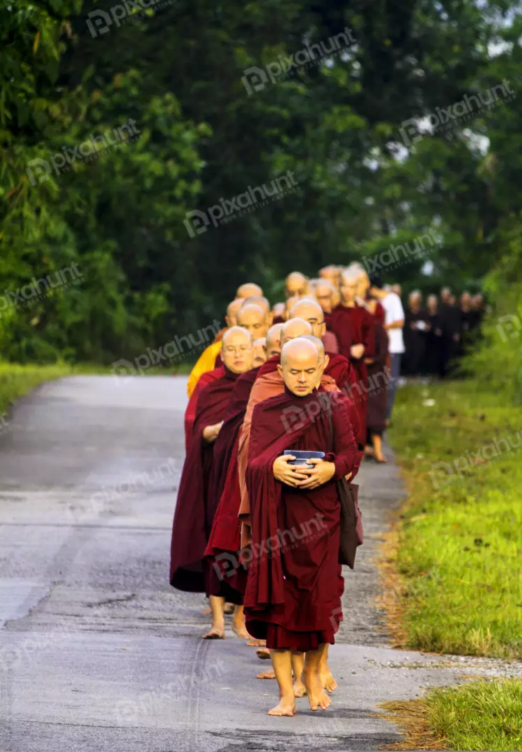 Free Premium Stock Photos Monks walking for morning alms in Bagan, Myanmar of the Burmese population is Buddhist.