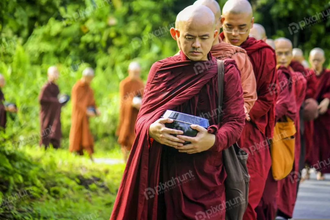 Free Premium Stock Photos Monks who live in the Mahagandayon monastery come out to receive food from donors