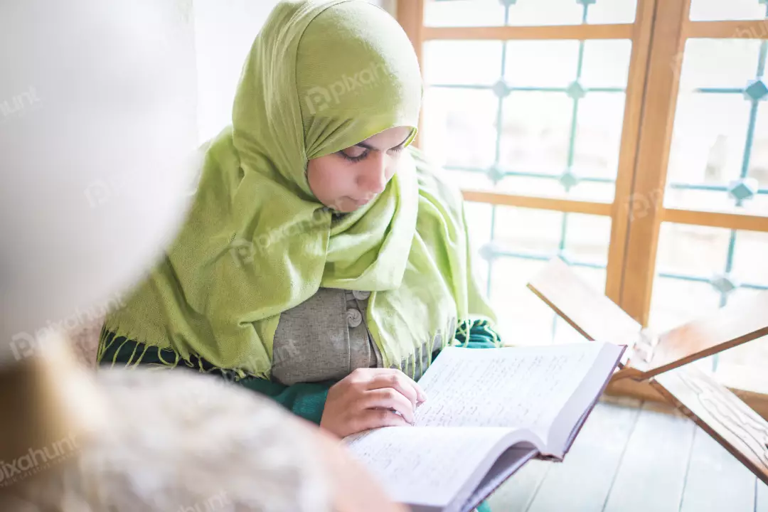 Free Premium Stock Photos Muslim Woman Reading holy Quran very carefully