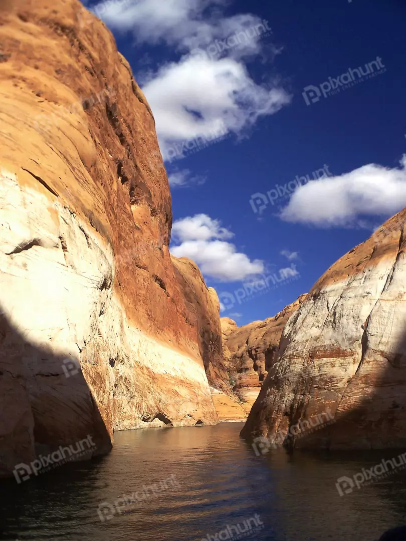 Free Premium Stock Photos Redwall limestone towers over the Colorado River in the Grand Canyon in Arizona.