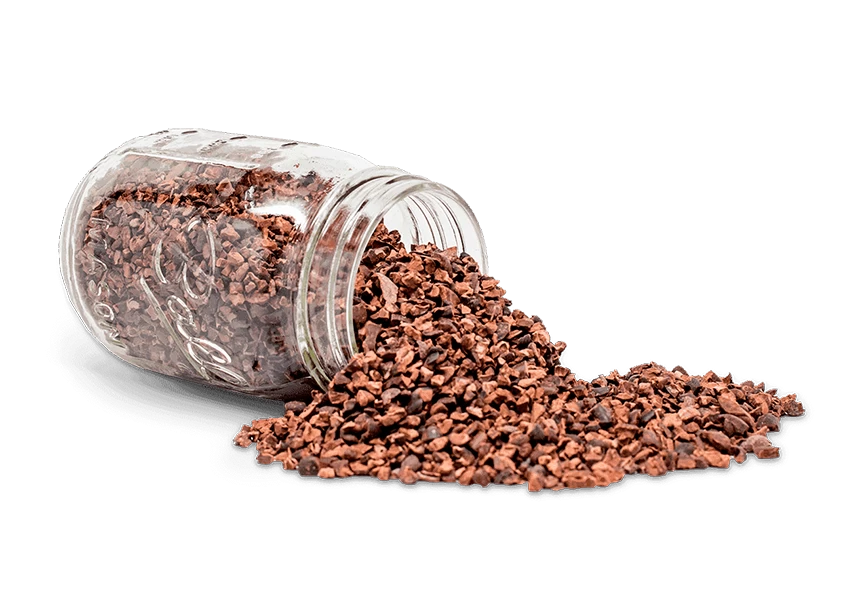 Free Premium PNG Small bucket lodged in a pile of scattered buckwheat on marble surface