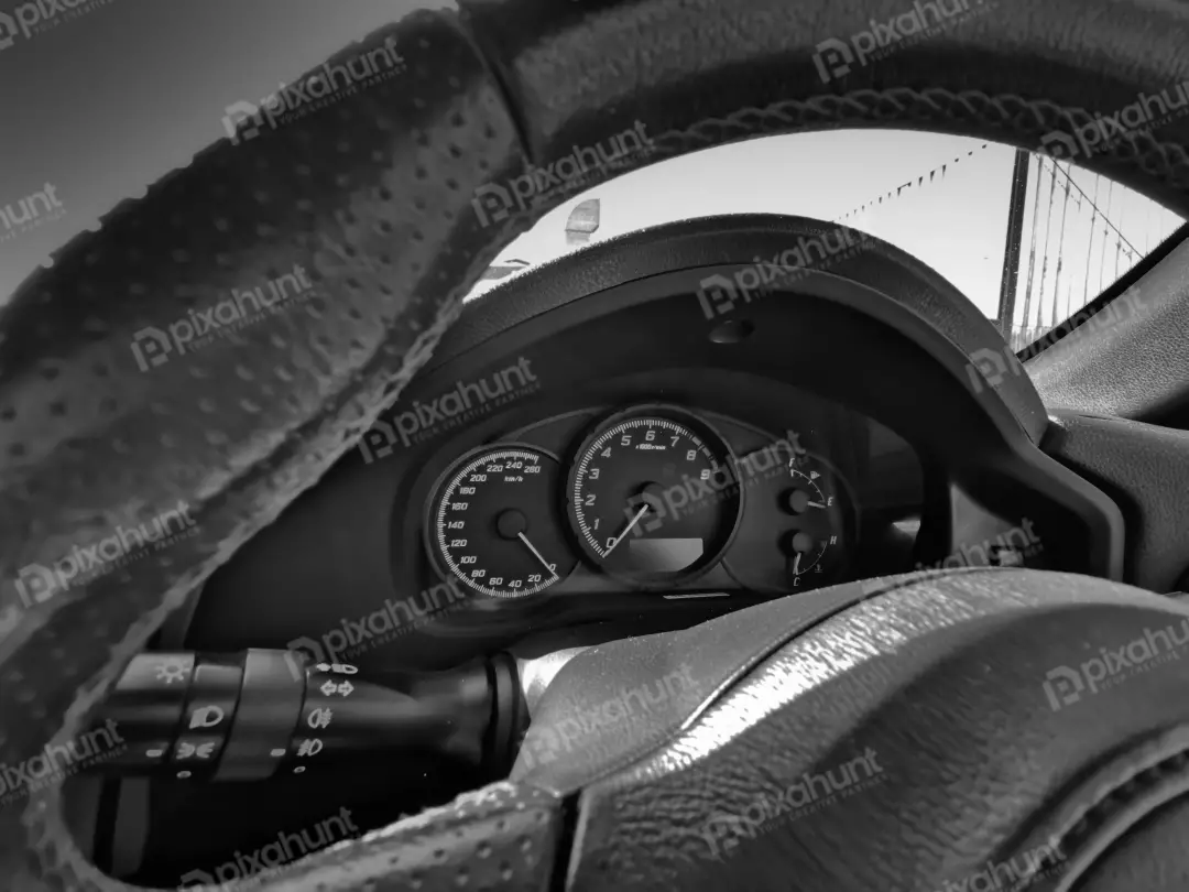 Free Premium Stock Photos Speed indication on the steering wheel in a car