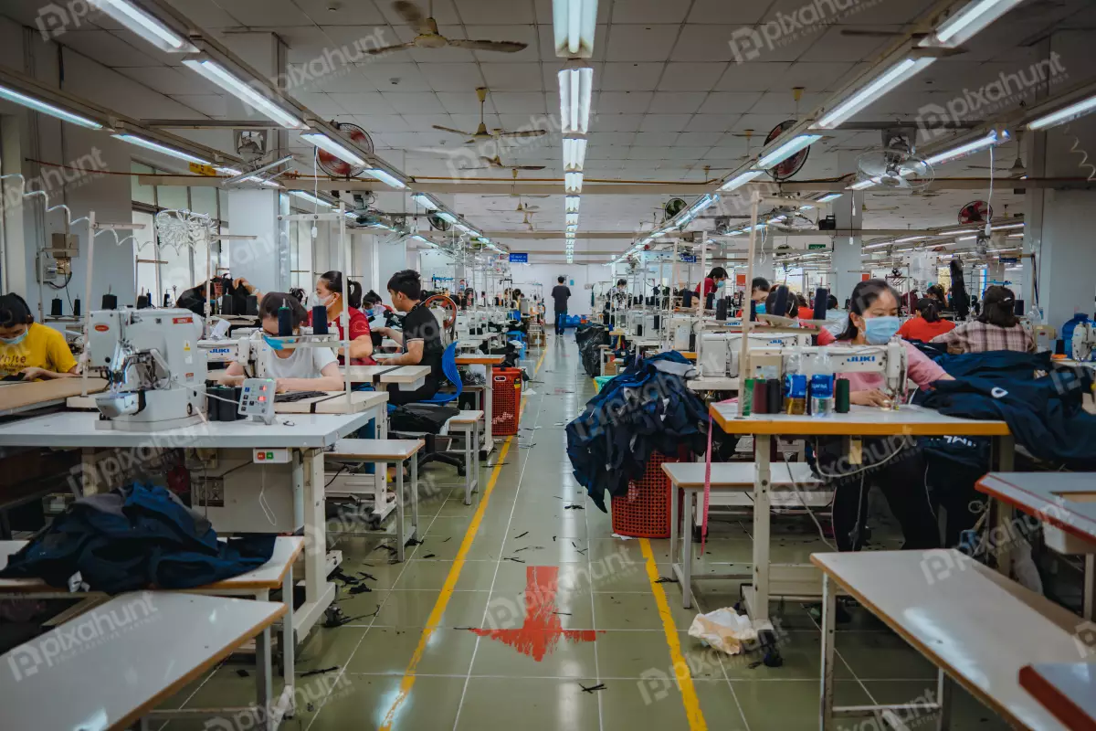 Free Premium Stock Photos Textile cloth factory working process tailoring workers equipment this is a sewing machine factory | original clothes and textiles in textile dyeing factory