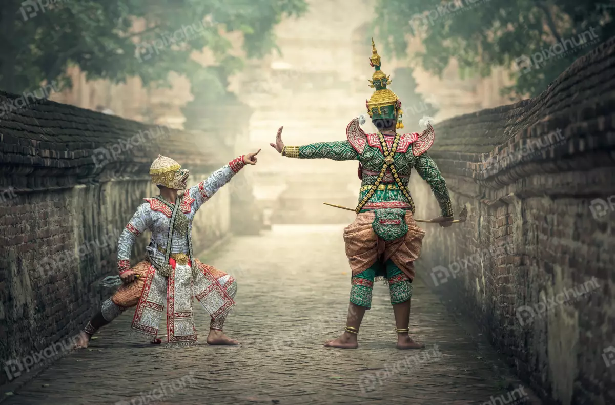 Free Premium Stock Photos Two Thai dancers actors in traditional costumes performing a Khon dance