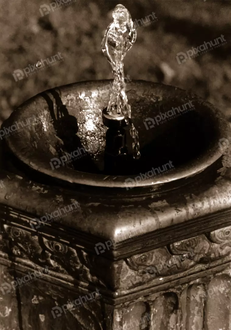 Free Premium Stock Photos Water dripping down an old fountain. Water droplets falling down into the lower fountain.