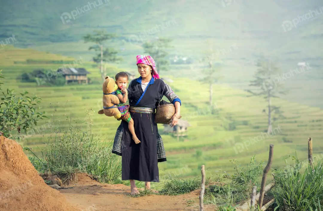 Free Premium Stock Photos A slightly low angle, looking up at a woman in traditional Vietnamese clothing