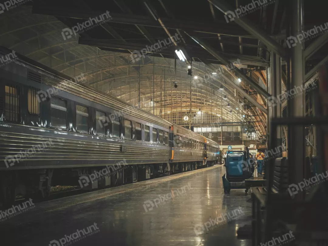 Free Premium Stock Photos Looking up at a train station also station is made of brick and has a large arched roof