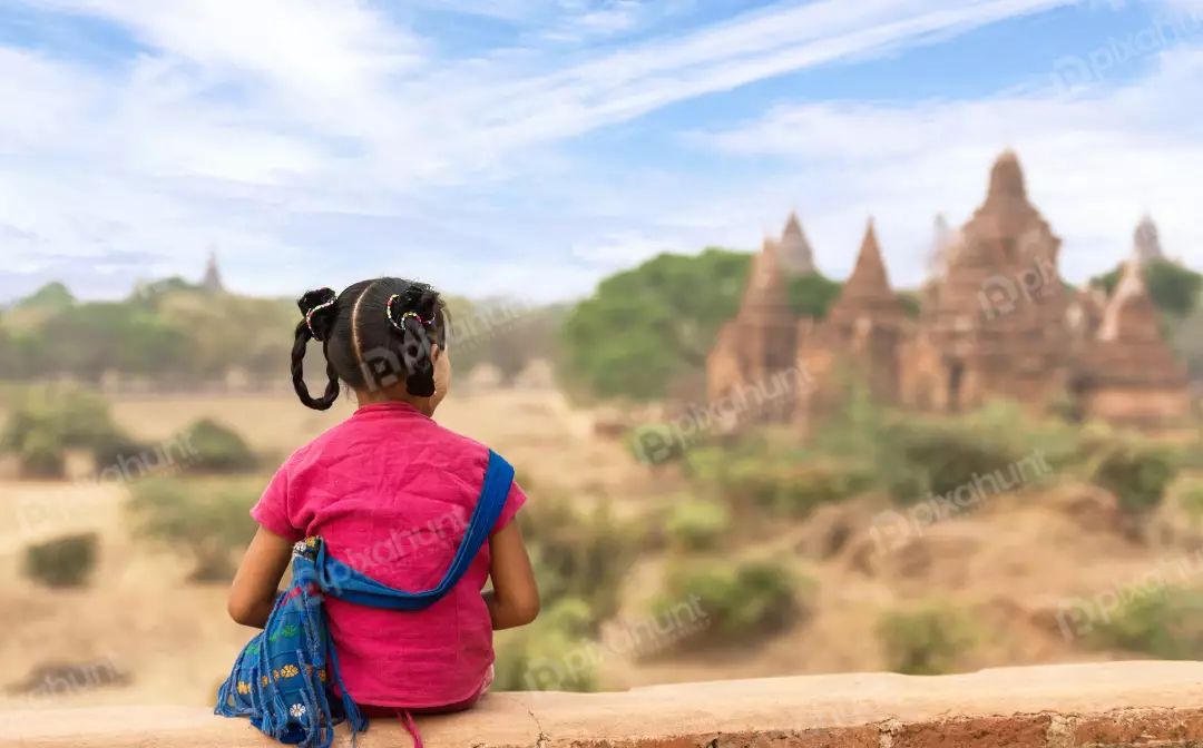 Free Premium Stock Photos Little girl is wearing a bright pink shirt and has her hair tied up in two pigtails