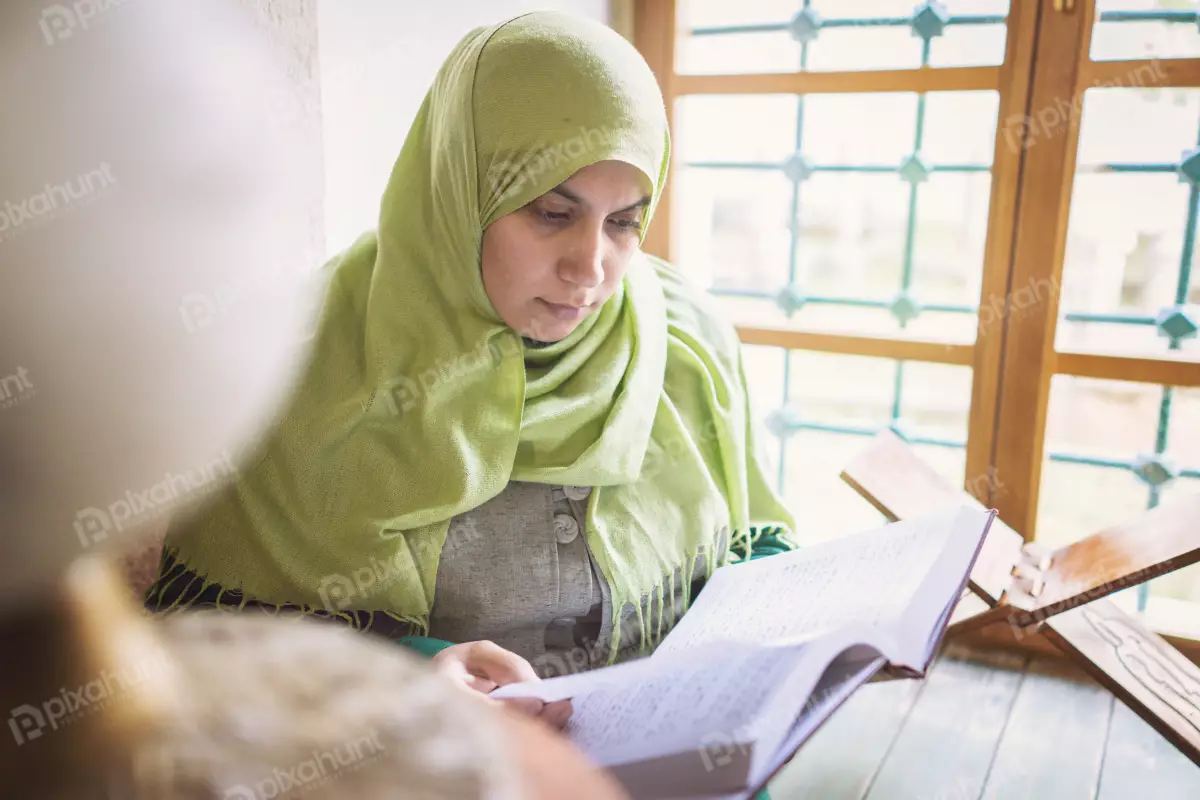 Free Premium Stock Photos Muslim Woman Reading The Holy Book In A Mosque