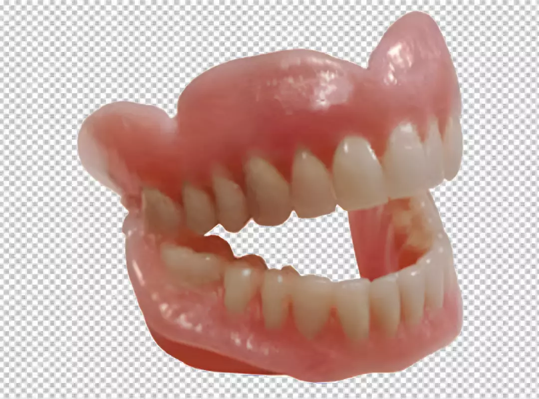 Free Premium PNG The dentures are made of a pink acrylic material and have a full set of teeth