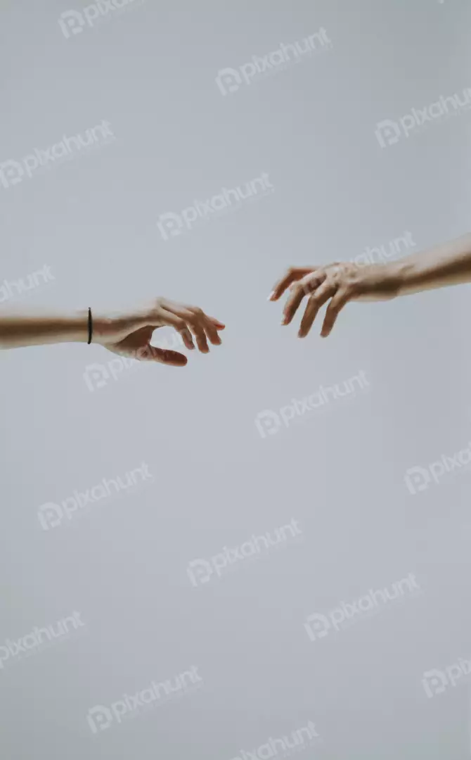 Free Premium Stock Photos two hands reaching out to each other