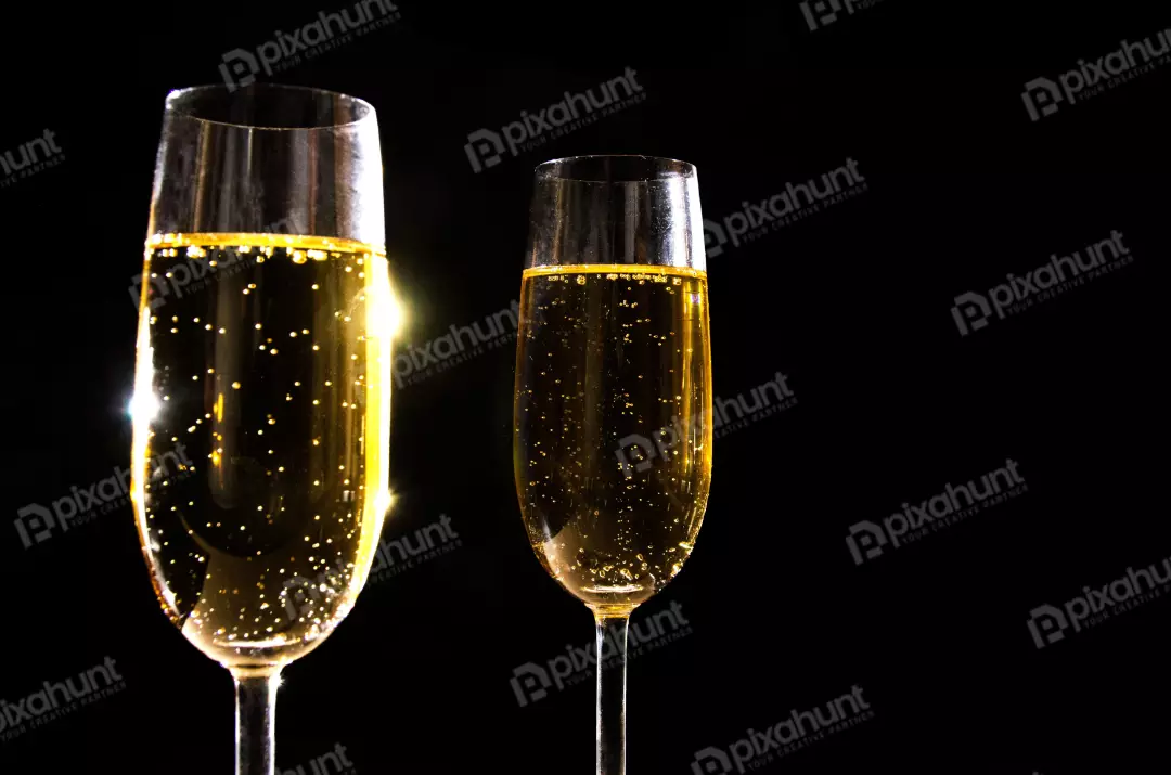 Free Premium Stock Photos A still life of a champagne glass and a champagne bottle