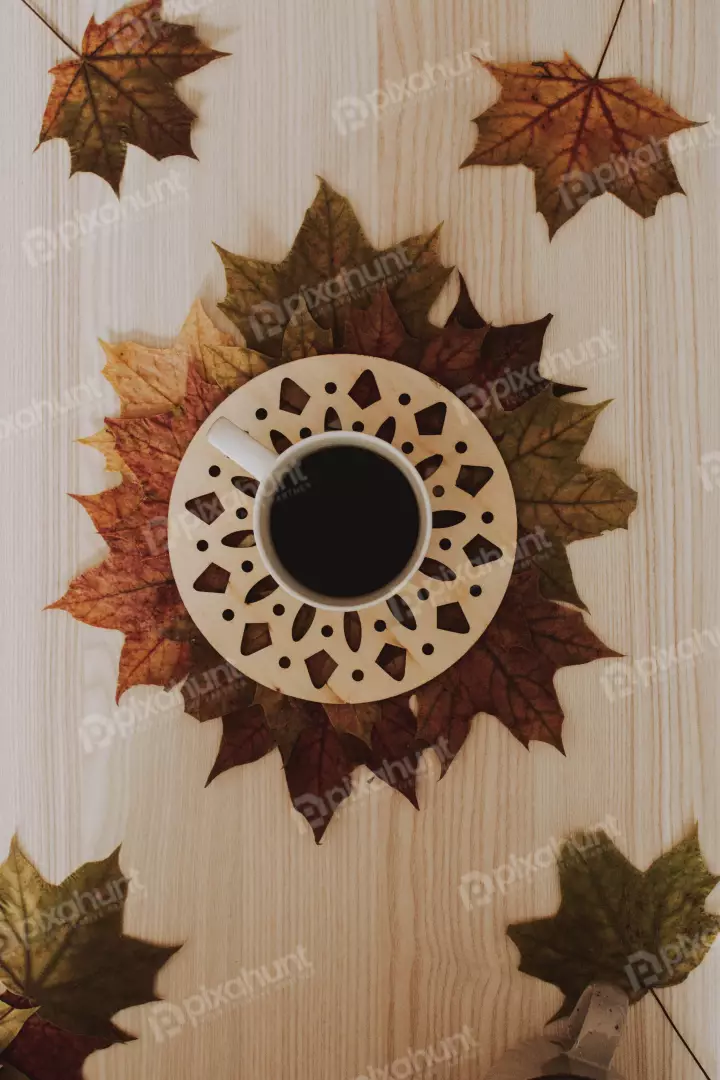 Free Premium Stock Photos a flat lay of a cup of coffee on a wooden table