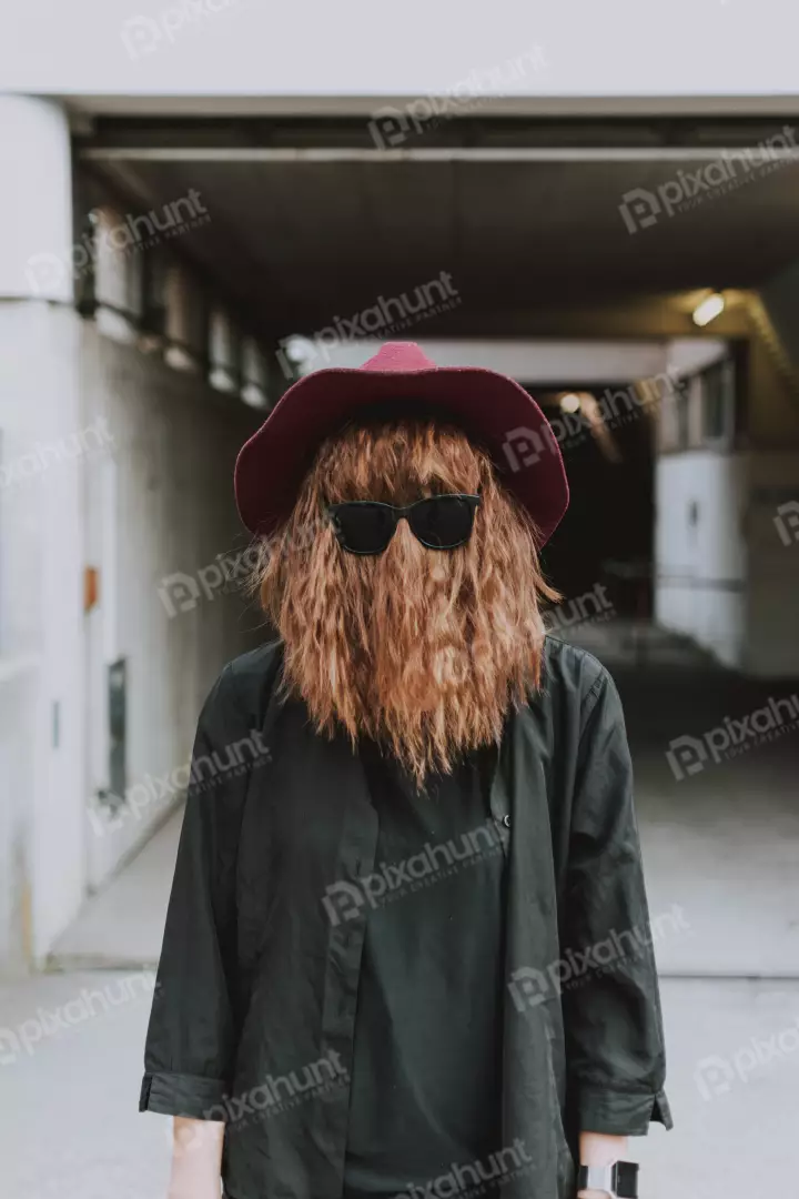 Free Premium Stock Photos Woman wearing a red hat and sunglasses