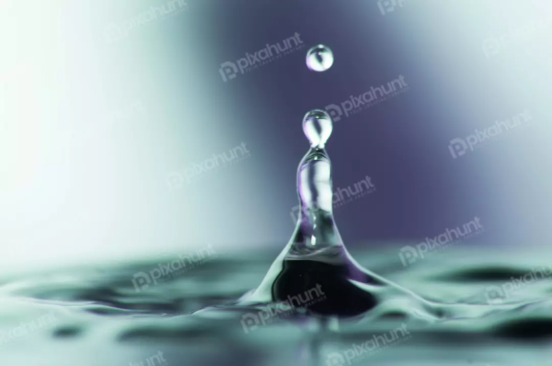 Free Premium Stock Photos The water droplet is lit from above bright highlight on the top of the droplet