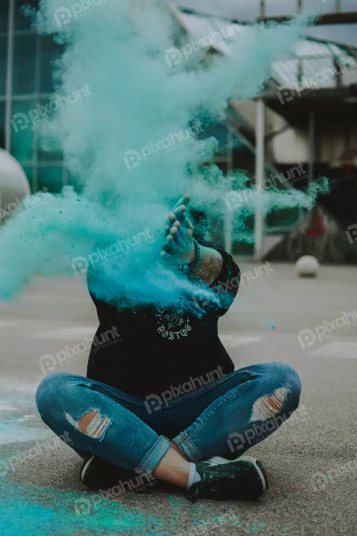 Free Premium Stock Photos looking up at a person sitting on the ground