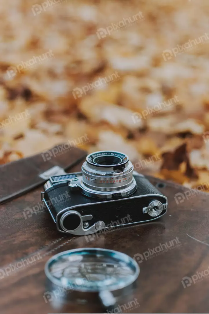 Free Premium Stock Photos Close-up of a vintage camera lens. The lens is made of metal and has a black and silver finish