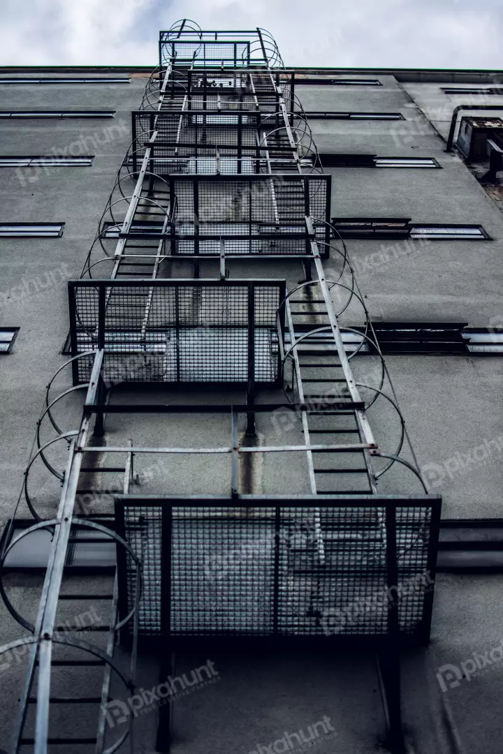 Free Premium Stock Photos a photograph of a fire escape on the side of a building