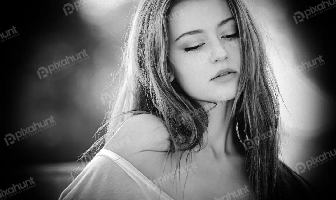 Free Premium Stock Photos A black and white portrait of a young woman