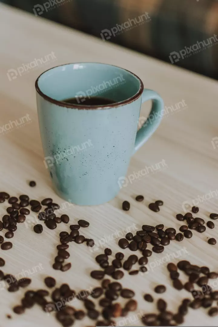 Free Premium Stock Photos a close-up of a blue coffee mug on a white table