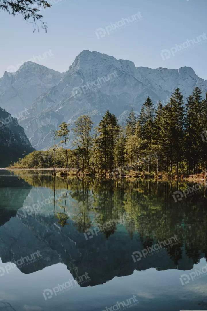 Free Premium Stock Photos a beautiful landscape of a mountain range and a lake