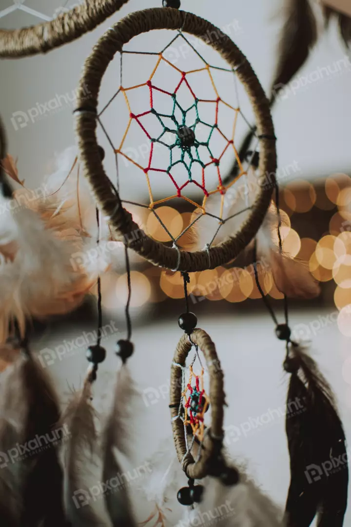 Free Premium Stock Photos The dreamcatcher is hanging at a slight angle