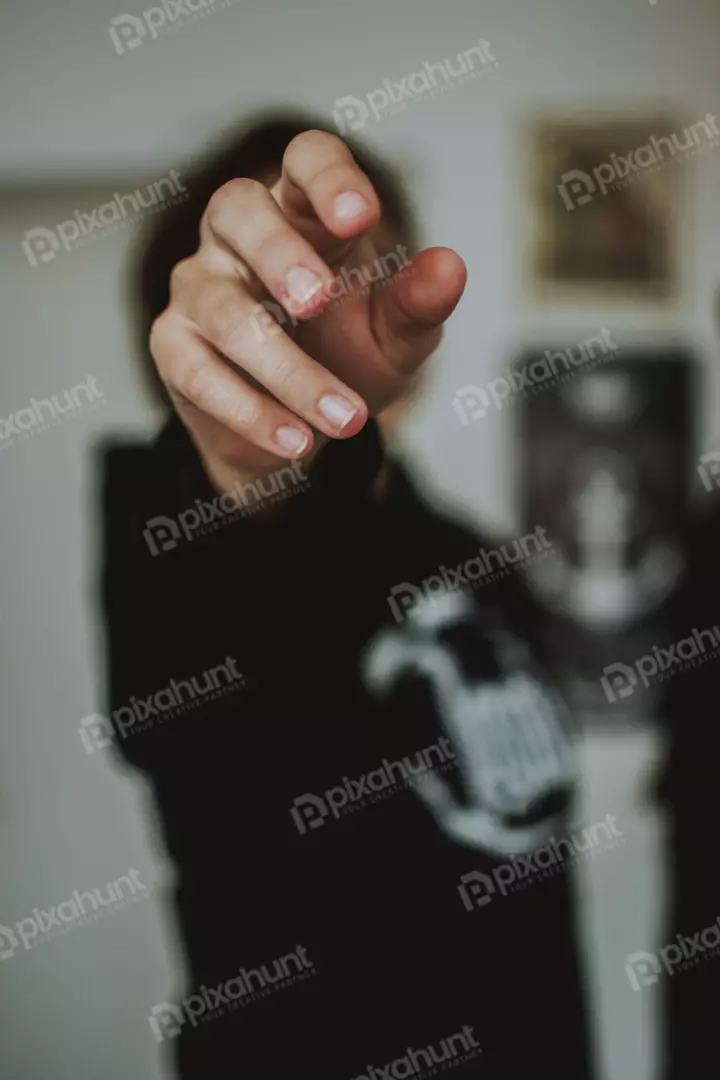 Free Premium Stock Photos The hand is in the center of the photo and it is facing the camera