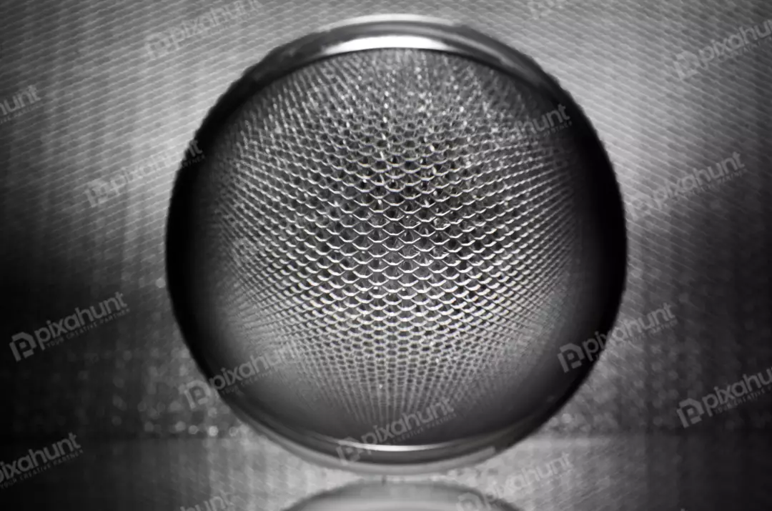 Free Premium Stock Photos A close-up of a metal speaker grill