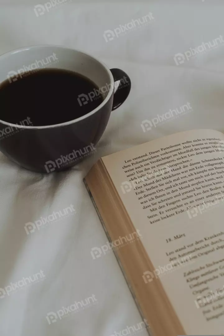 Free Premium Stock Photos a cup of coffee on a white sheet