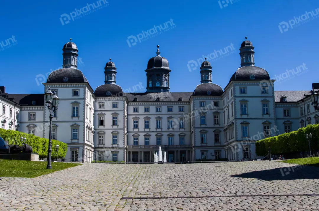 Free Premium Stock Photos A beautiful castle with a blue sky in the background