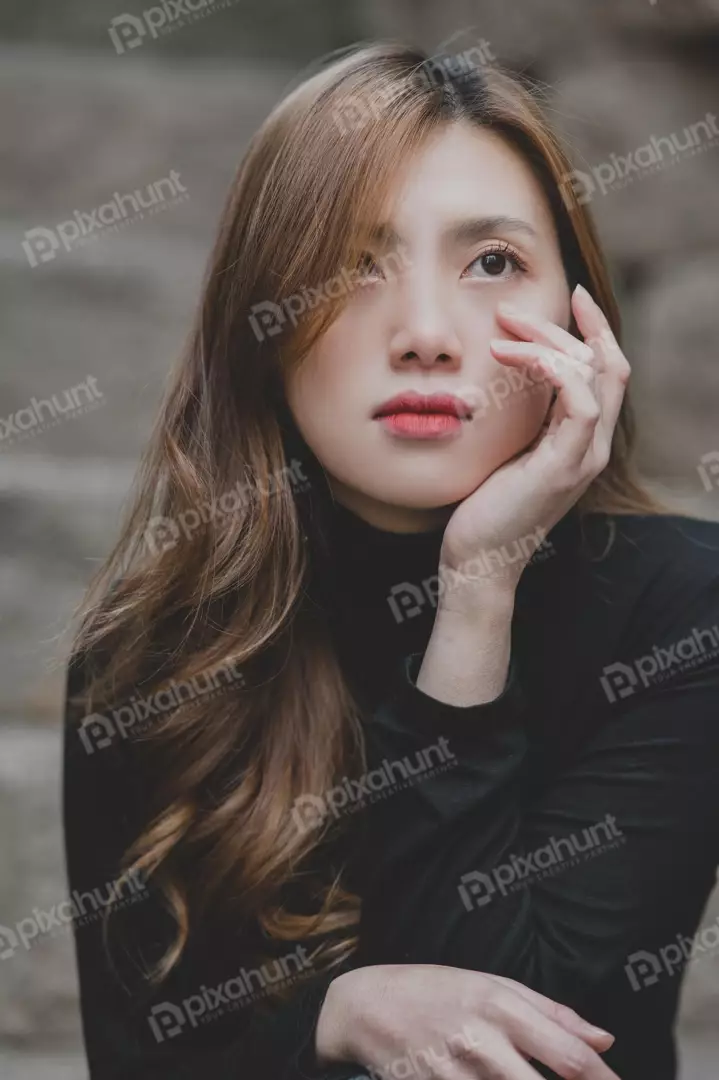 Free Premium Stock Photos A young woman with long brown hair and light makeup