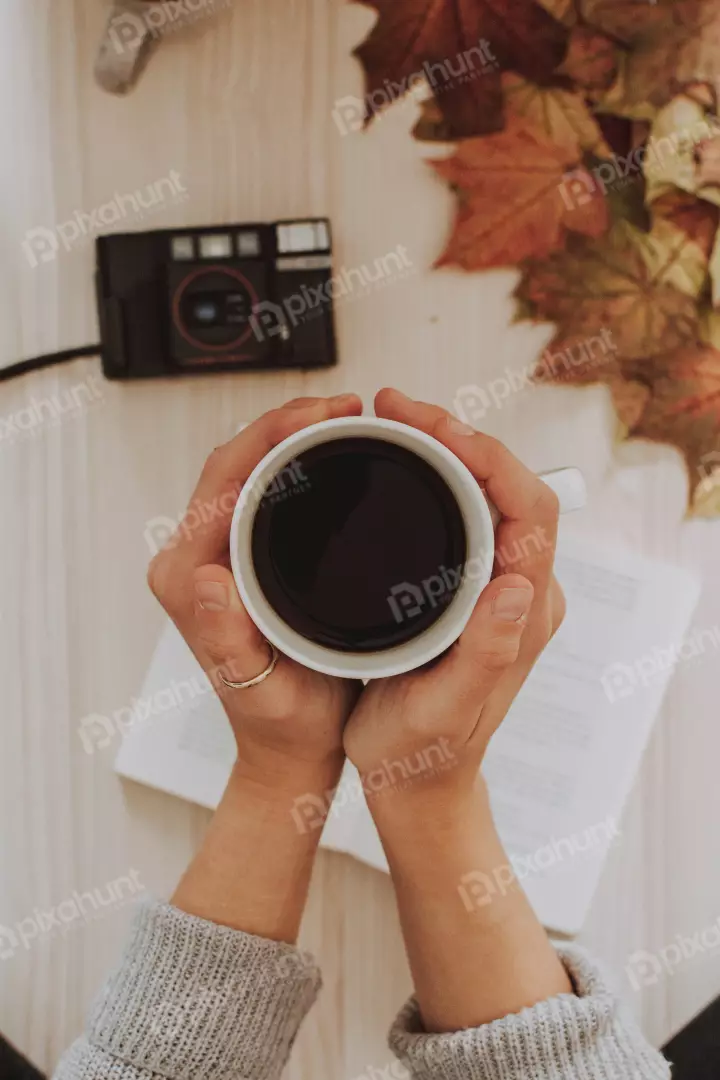 Free Premium Stock Photos a flat lay of a cup of coffee on a table