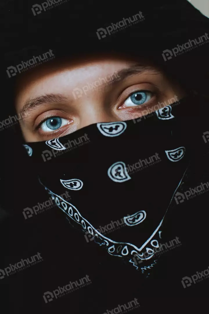 Free Premium Stock Photos Woman wearing a black bandana that covers her mouth and nose