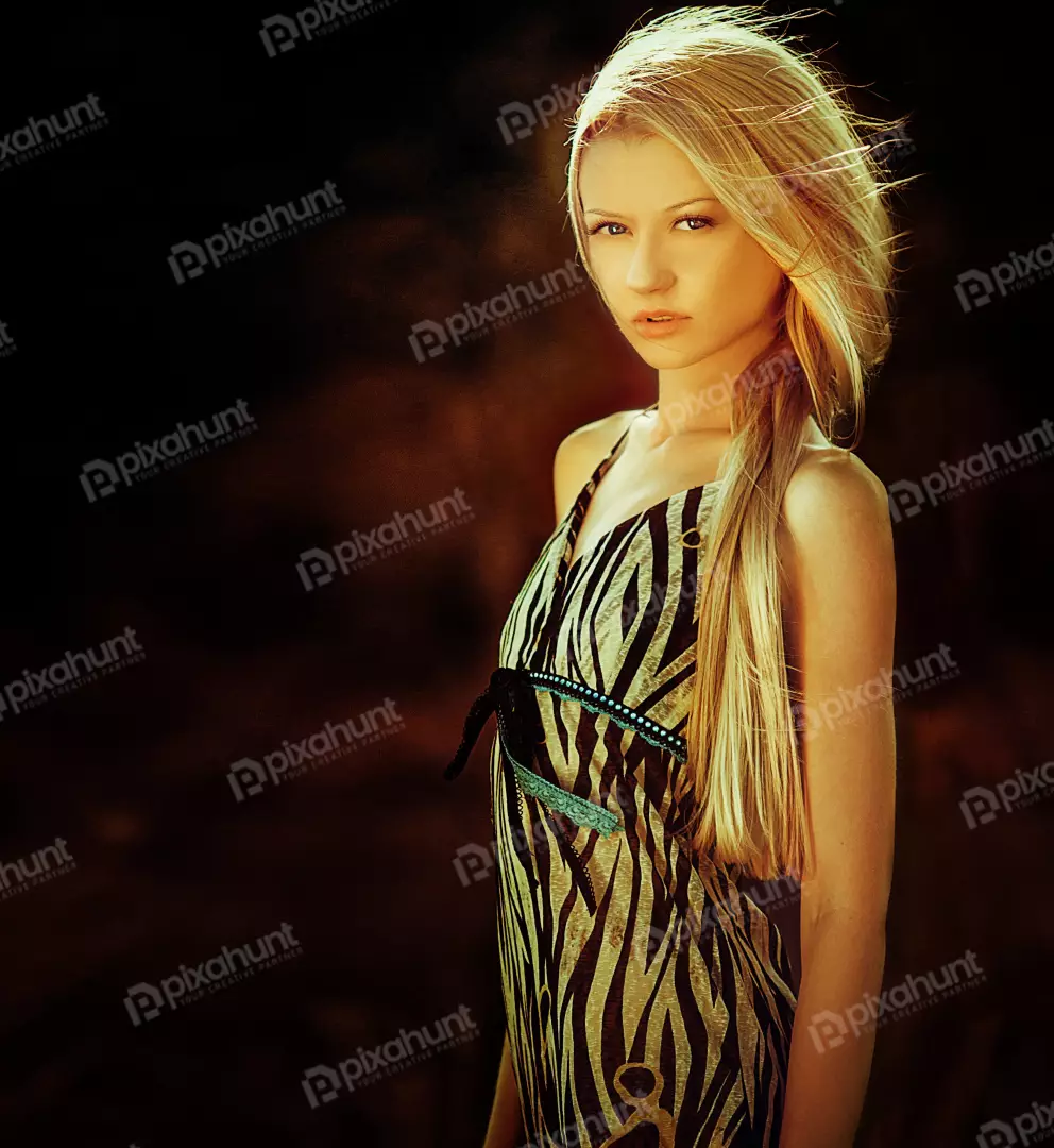 Free Premium Stock Photos A portrait of a young woman with long blond hair