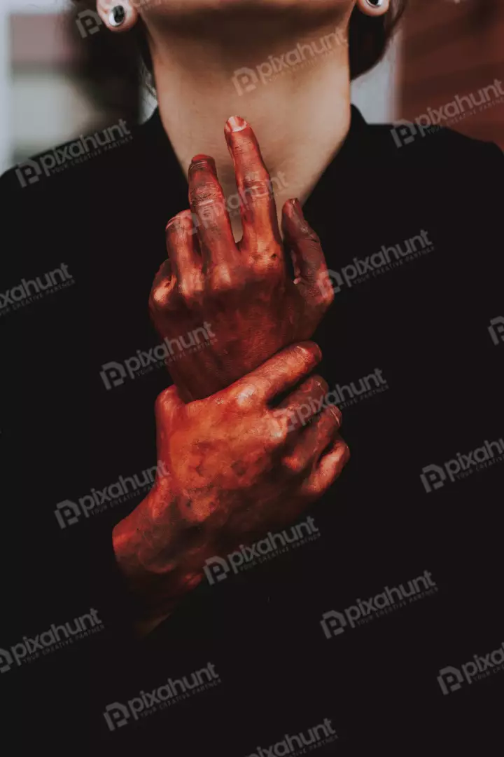 Free Premium Stock Photos The woman is wearing a black long-sleeved shirt and has her hands clasped together in front of her