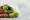 Fresh ripe vegetables placed on Wooden box full of a stone background