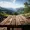 wooden tabletop against backdrop of majestic mountain peak blank surface